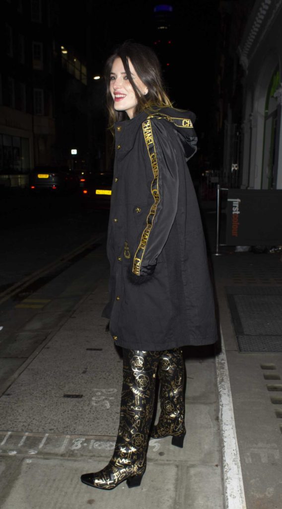Bella Thorne in a Black Coat