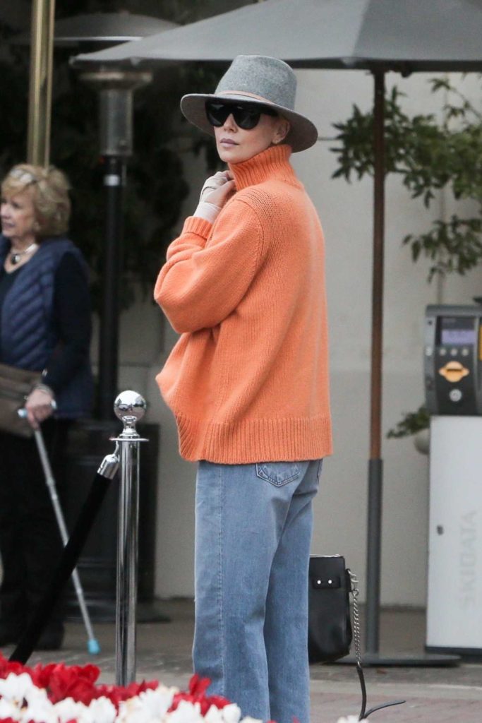 Charlize Theron in a Gray Hat