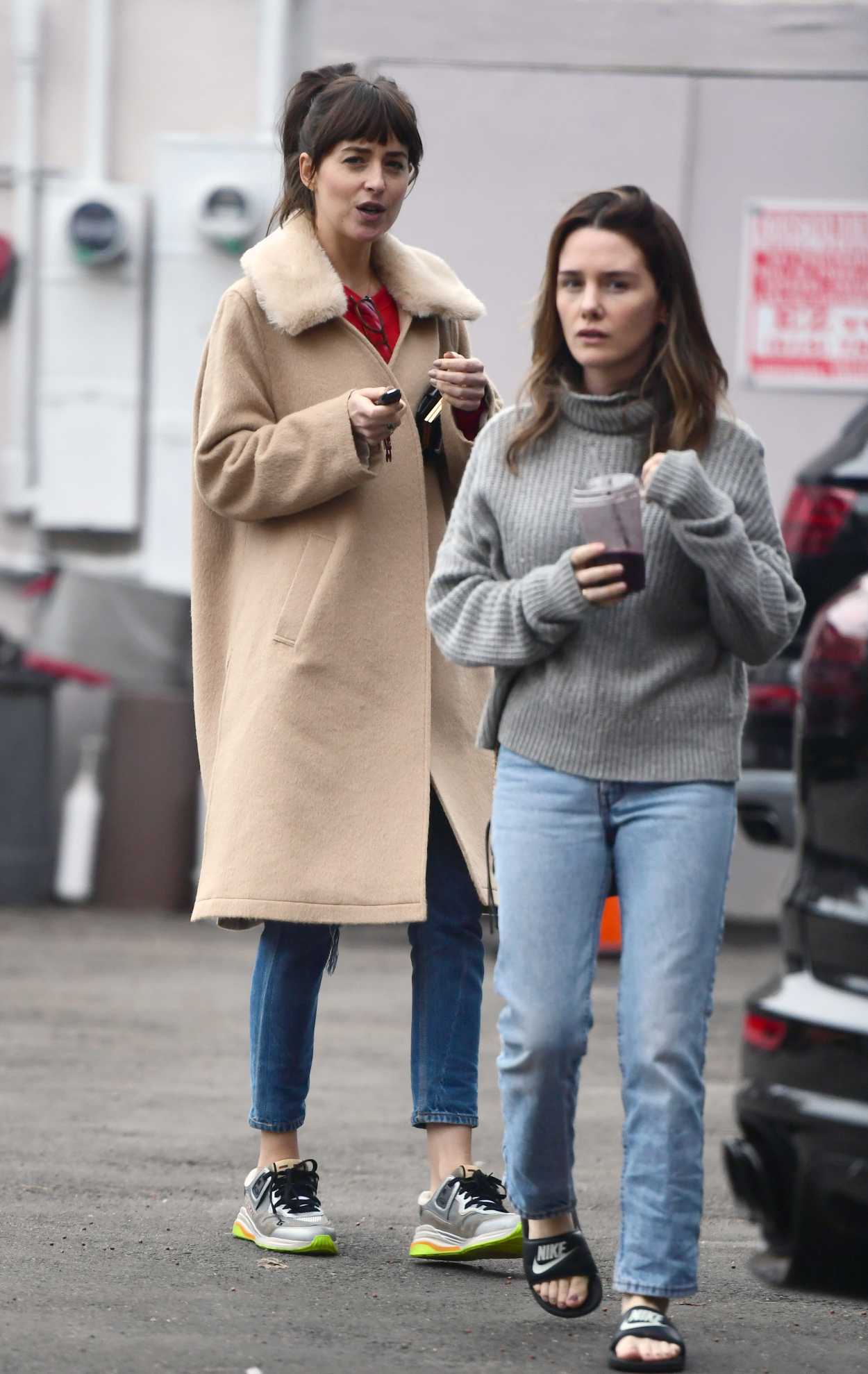Dakota Johnson in a Beige Coat Heads to the Nail Salon with Addison ...