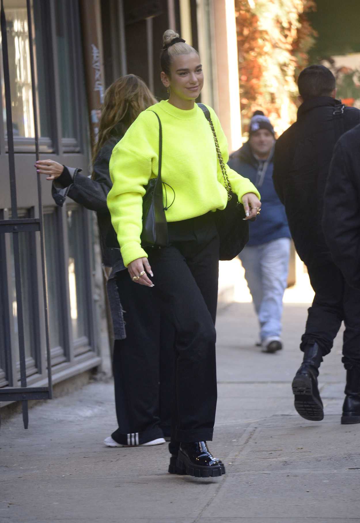 Dua Lipa in a Neon Green Sweatshirt Leaves Her Apartment in NYC 12/21 ...