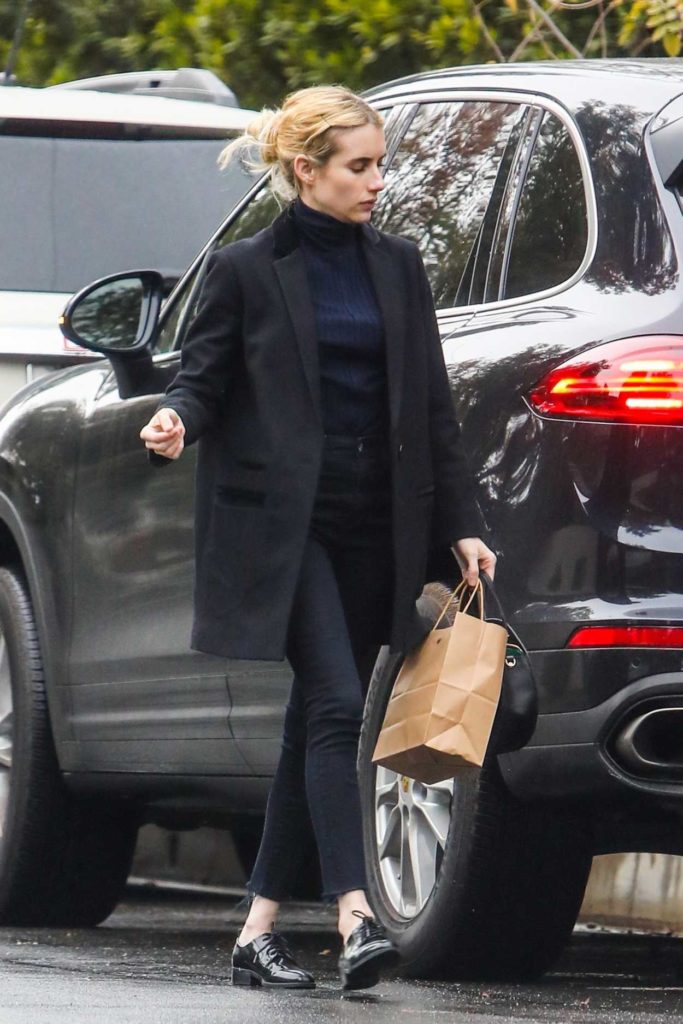 Emma Roberts in a Black Blazer