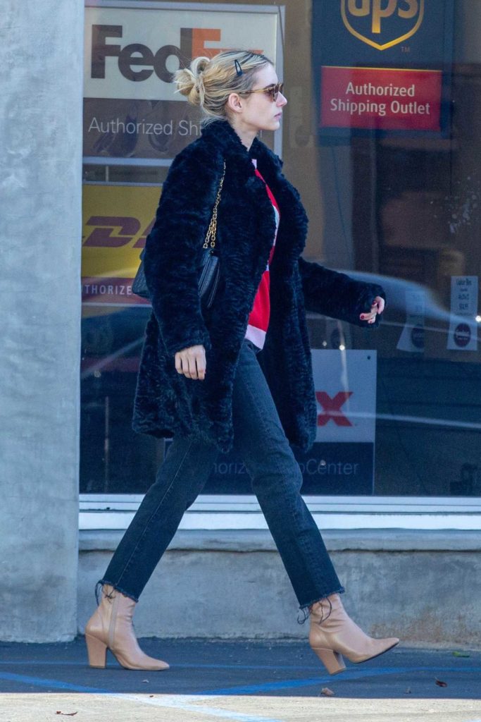 Emma Roberts in a Black Fur Coat