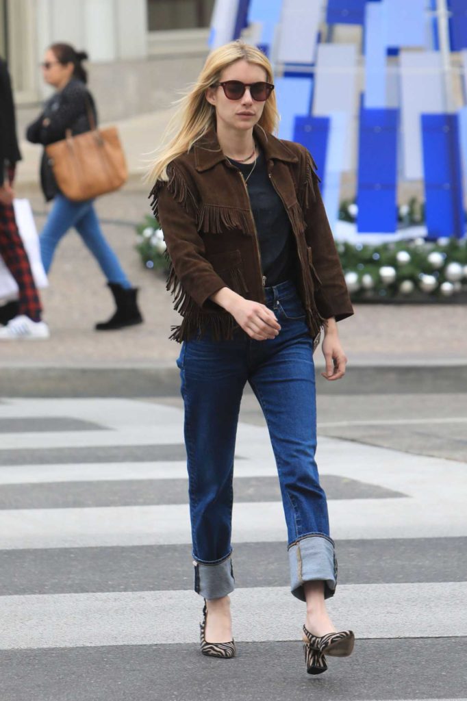 Emma Roberts in a Brown Jacket