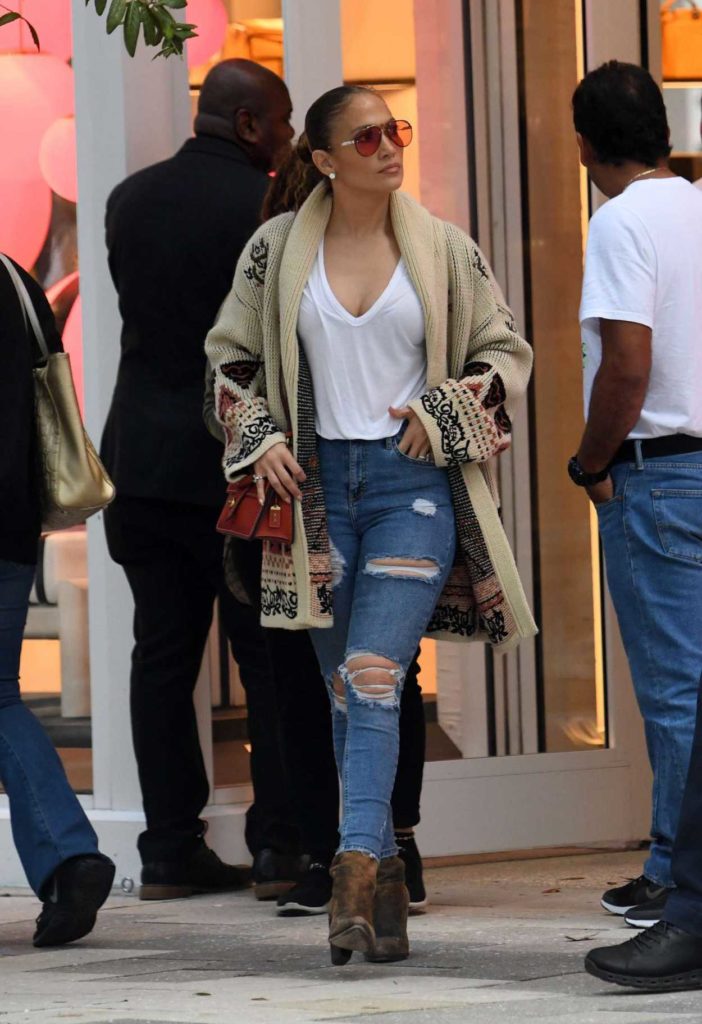 Jennifer Lopez in a Blue Ripped Jeans Goes Shopping in Miami 12/24/2019 ...