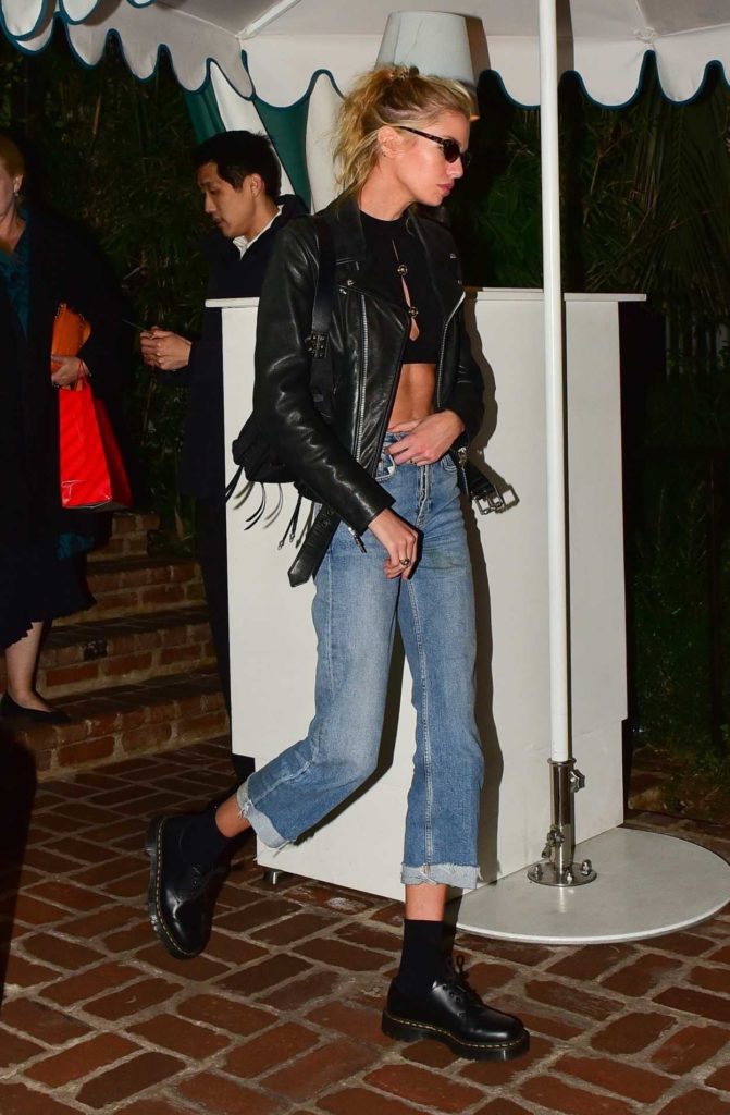 Stella Maxwell in a Black Leather Jacket