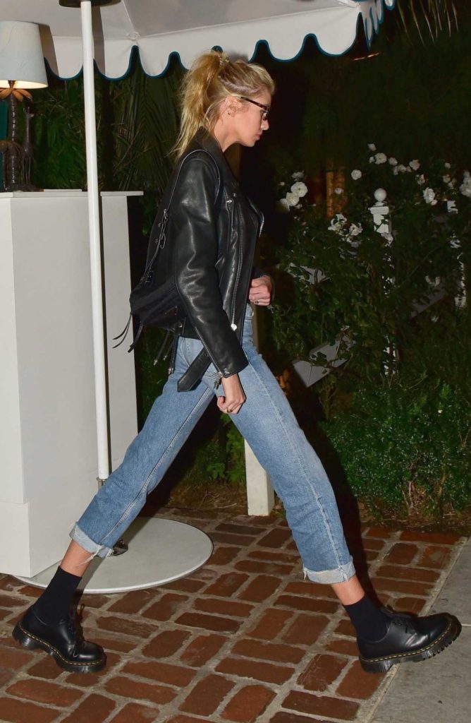 Stella Maxwell in a Black Leather Jacket