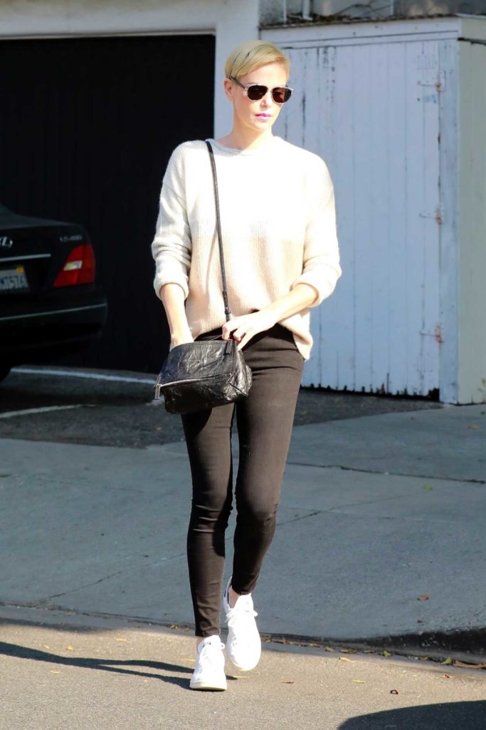 Charlize Theron in a White Sneakers