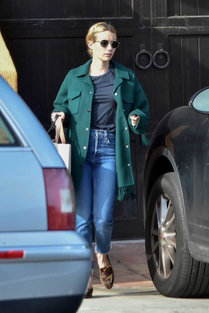 Emma Roberts in a Green Coat