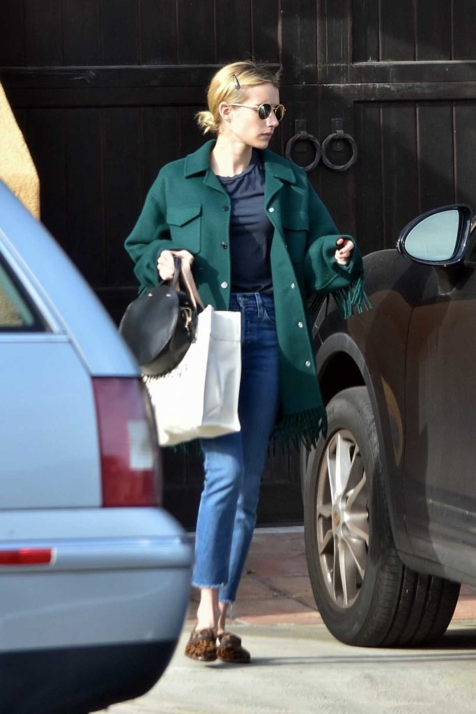 Emma Roberts in a Green Coat