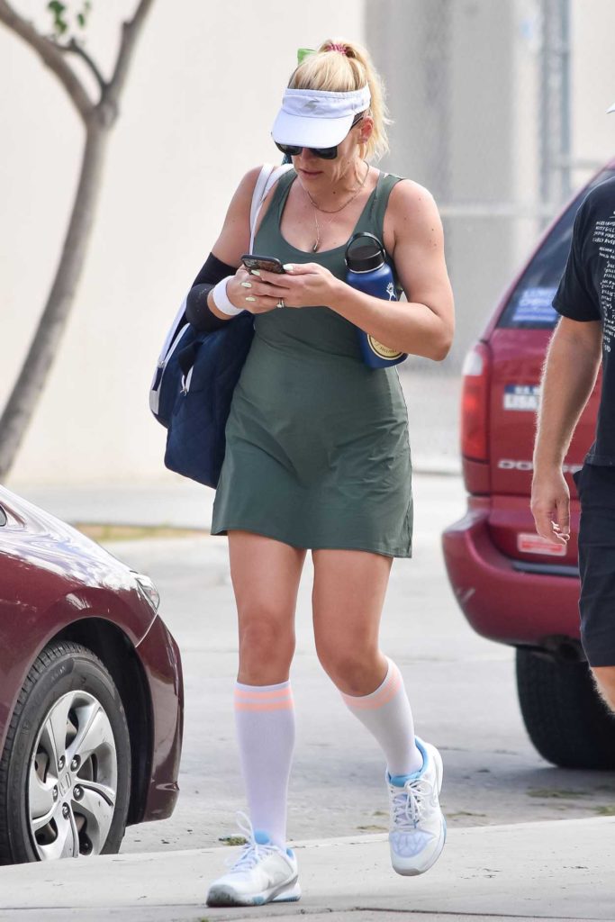Busy Philipps in a White Sneakers
