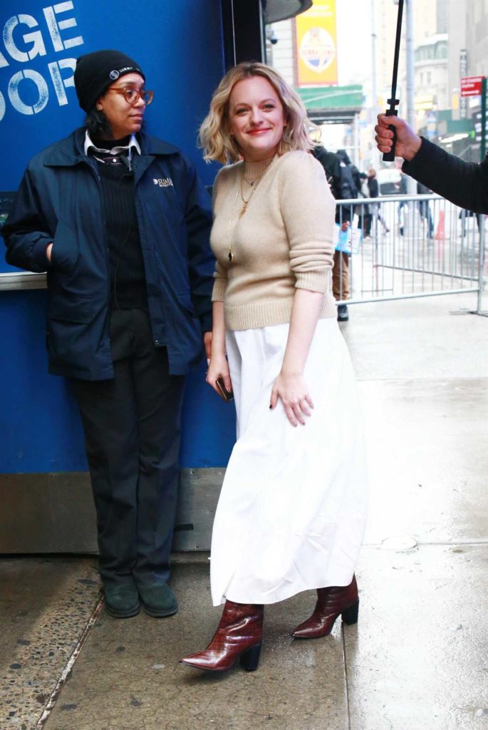 Elisabeth Moss in a White Skirt