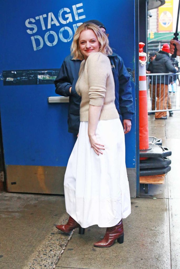 Elisabeth Moss in a White Skirt