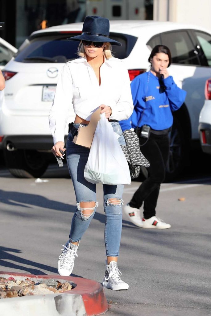 Khloe Kardashian in a White Blouse