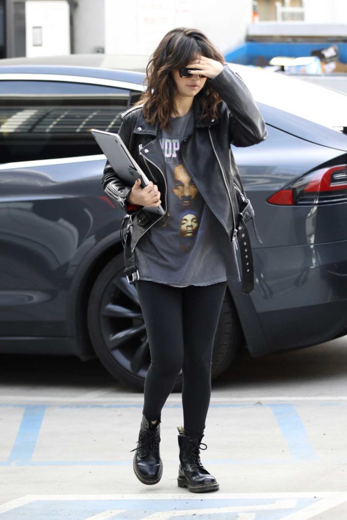 Selena Gomez in a Black Boots