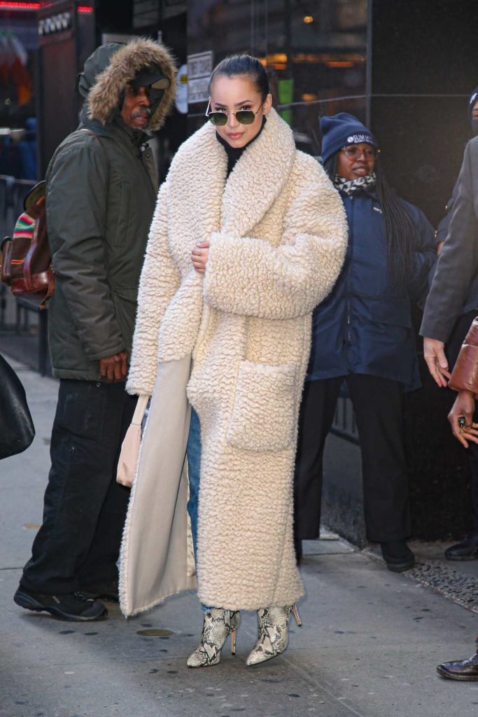 Sofia Carson in a Beige Fur Coat