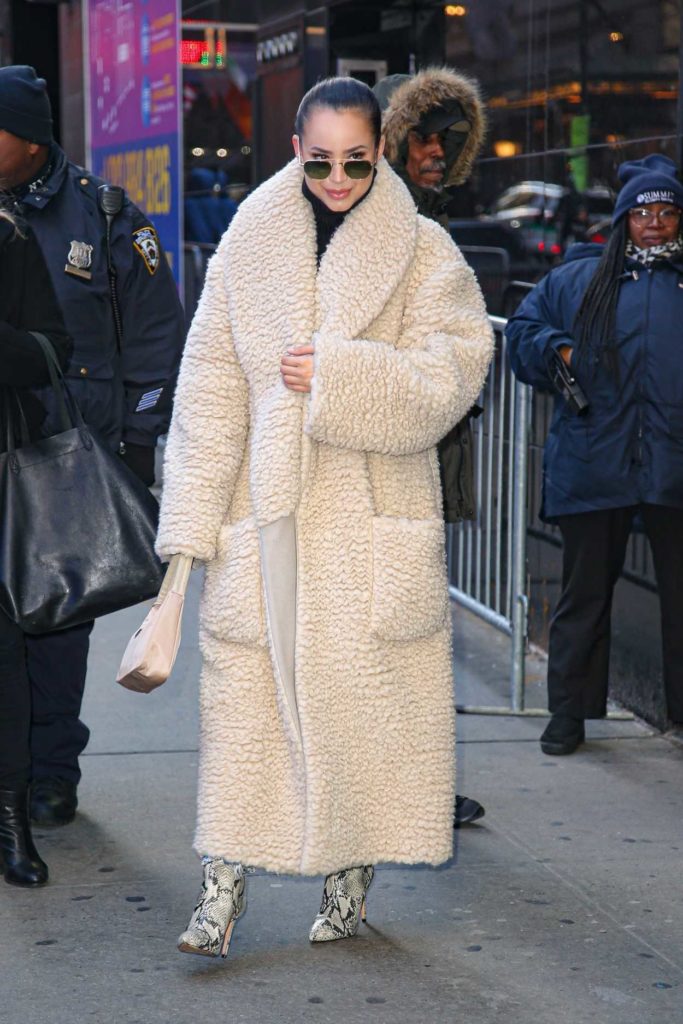 Sofia Carson in a Beige Fur Coat