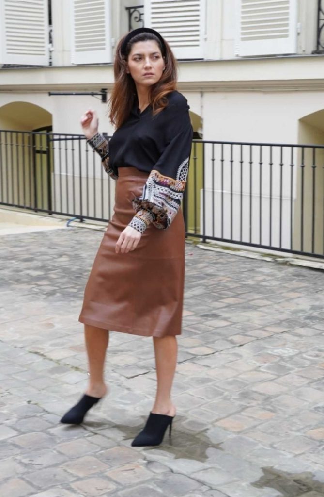 Blanca Blanco in a Brown Leather Skirt
