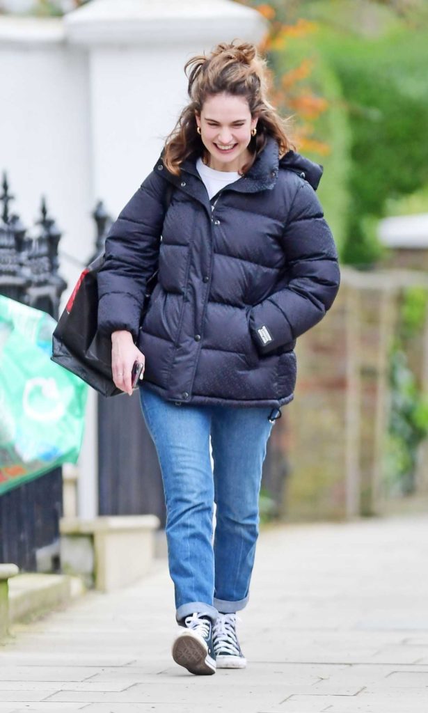 Lily James in a Black Puffer Jacket