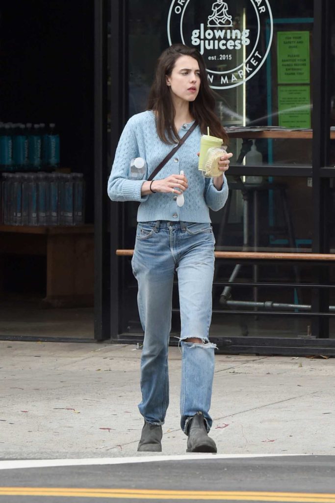 Margaret Qualley in a Blue Ripped Jeans