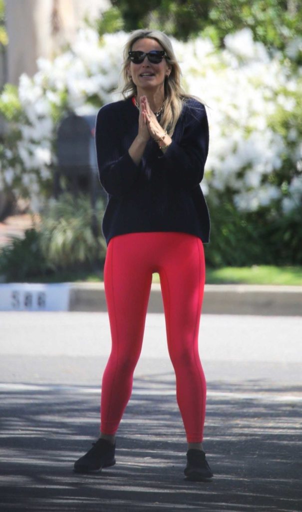 Molly Sims in a Red Leggings