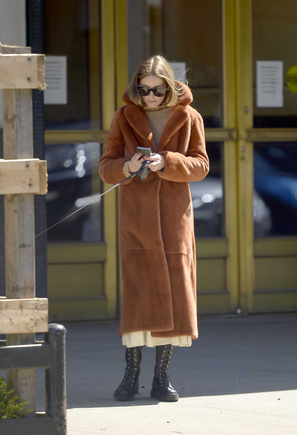 Olivia Palermo in a Tan Fur Coat Walks Her Dog in New York 03/24/2020