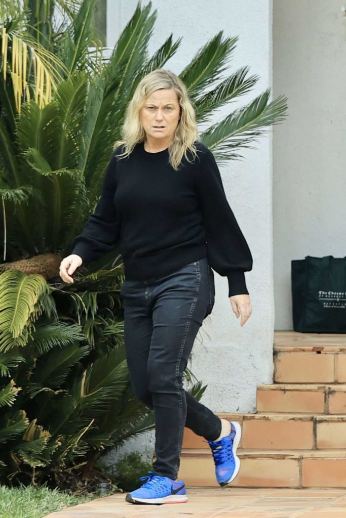 Amy Poehler in a Blue Sneakers