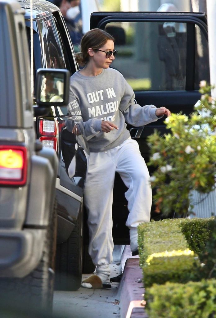 Ashley Tisdale in a Gray Sweatshirt