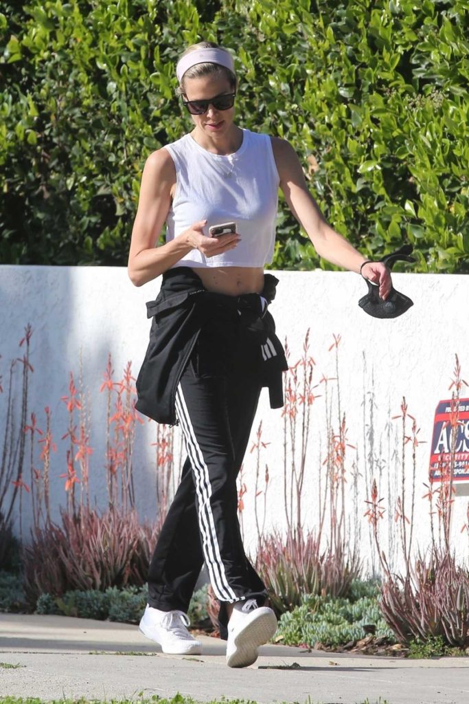 Brooke Burns in a Black Adidas Tracksuit