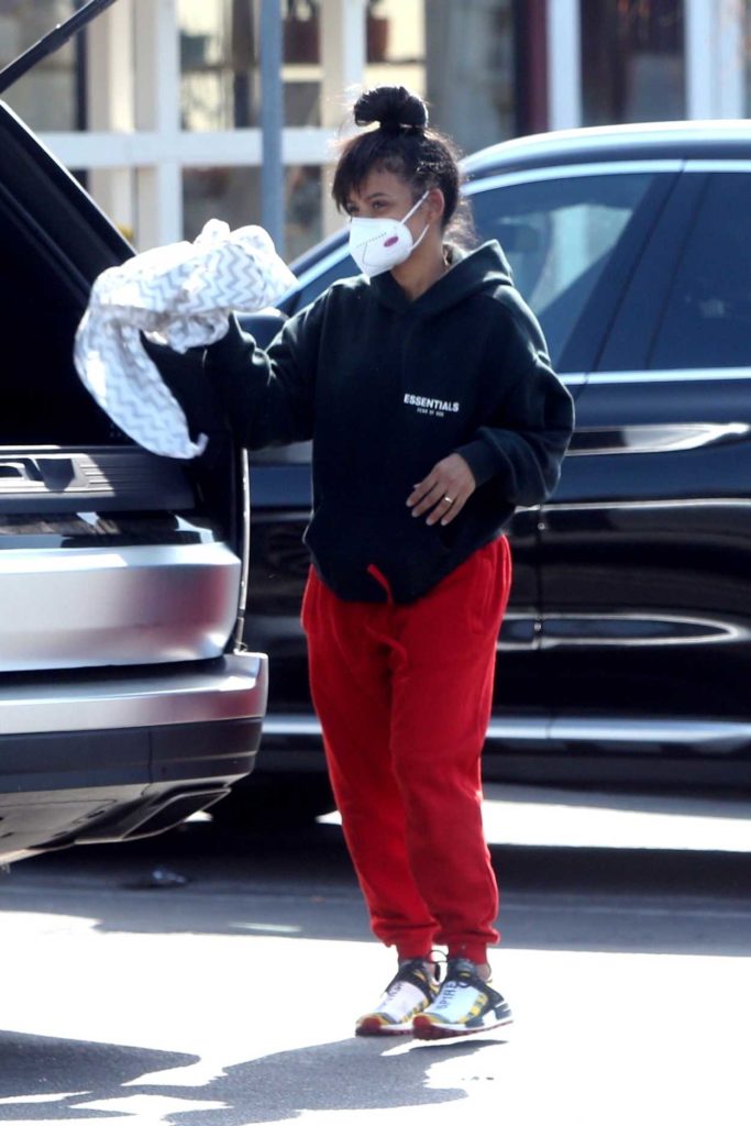 Christina Milian in a Red Sweatpants
