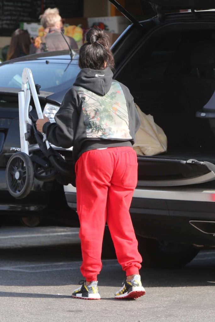 Christina Milian in a Red Sweatpants