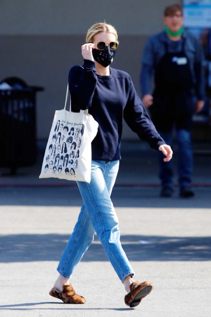 Emma Roberts in a Black Face Mask