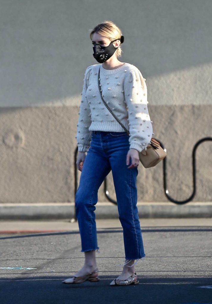 Emma Roberts in a Black Face Mask