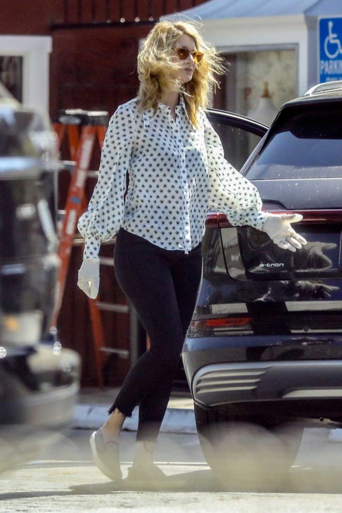 Laura Dern in a White Floral Blouse