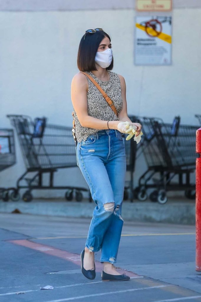 Lucy Hale in a Blue Ripped Jeans