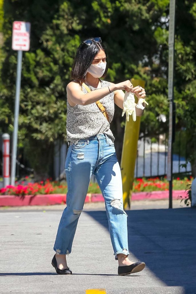 Lucy Hale in a Blue Ripped Jeans