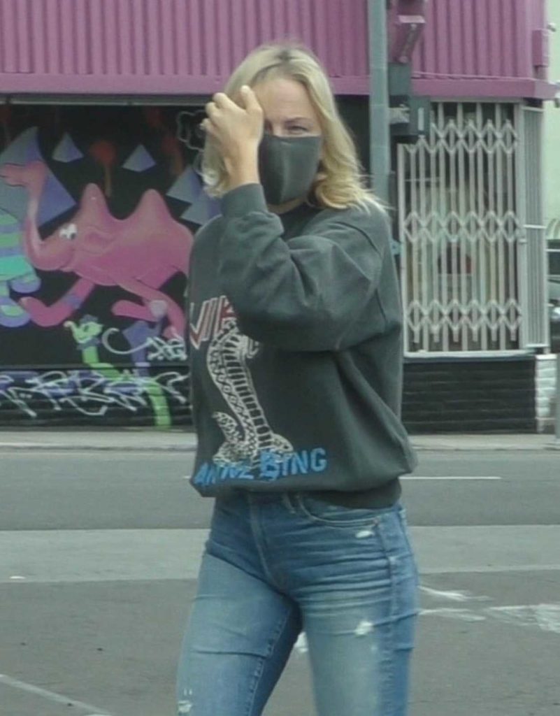 Malin Akerman in a Blue Ripped Jeans