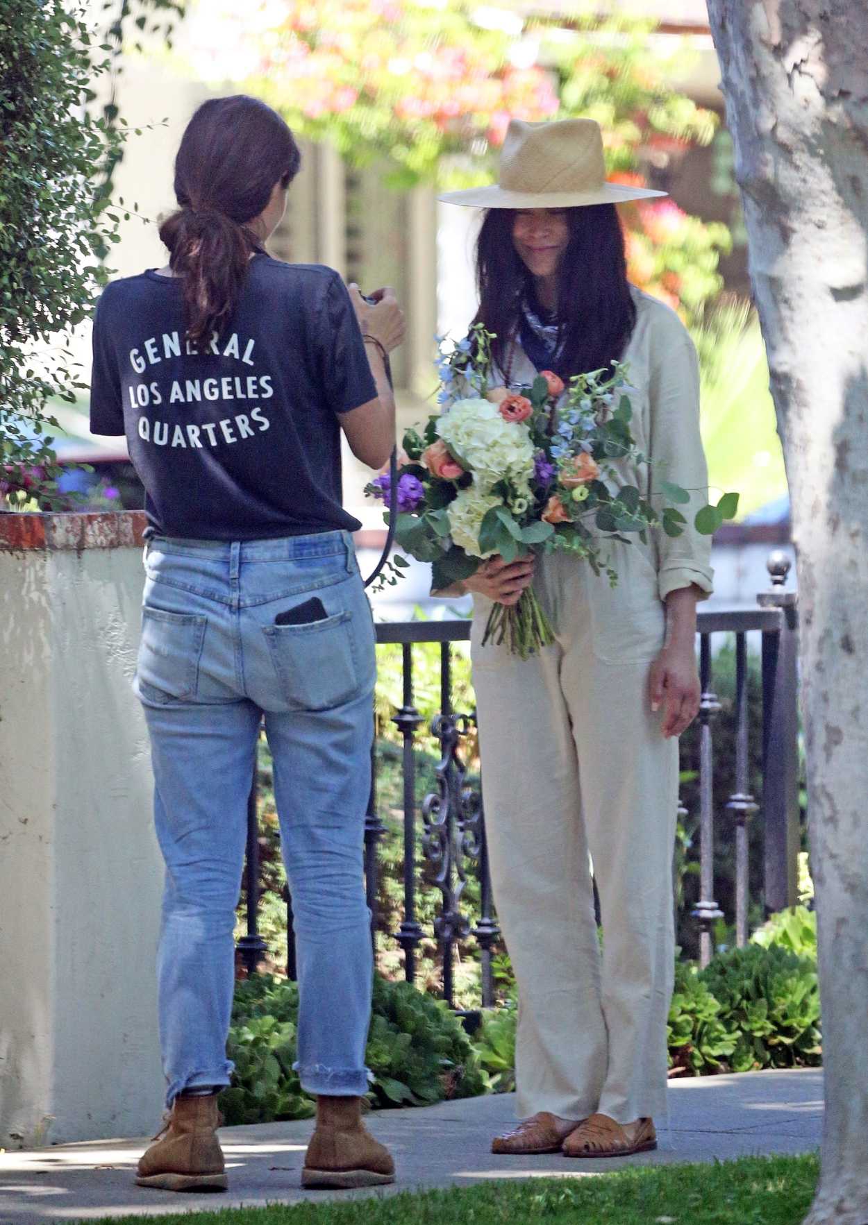 Abigail Spencer in a Beige Hat Does a Floral Photoshoot Outside Her ...
