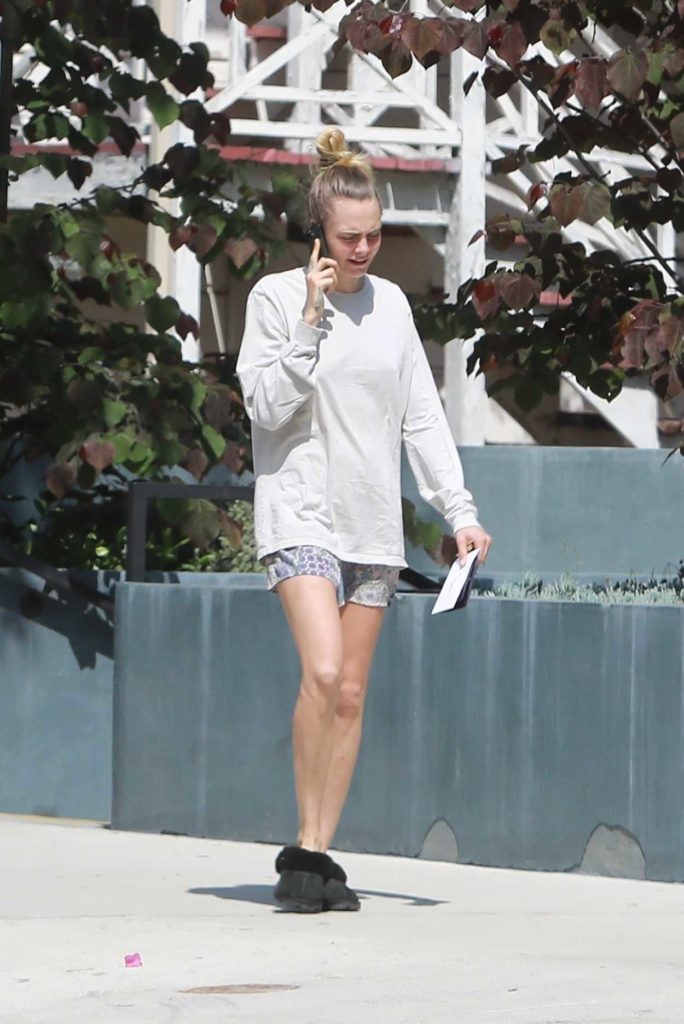Cara Delevingne in a White Long Sleeves T-Shirt