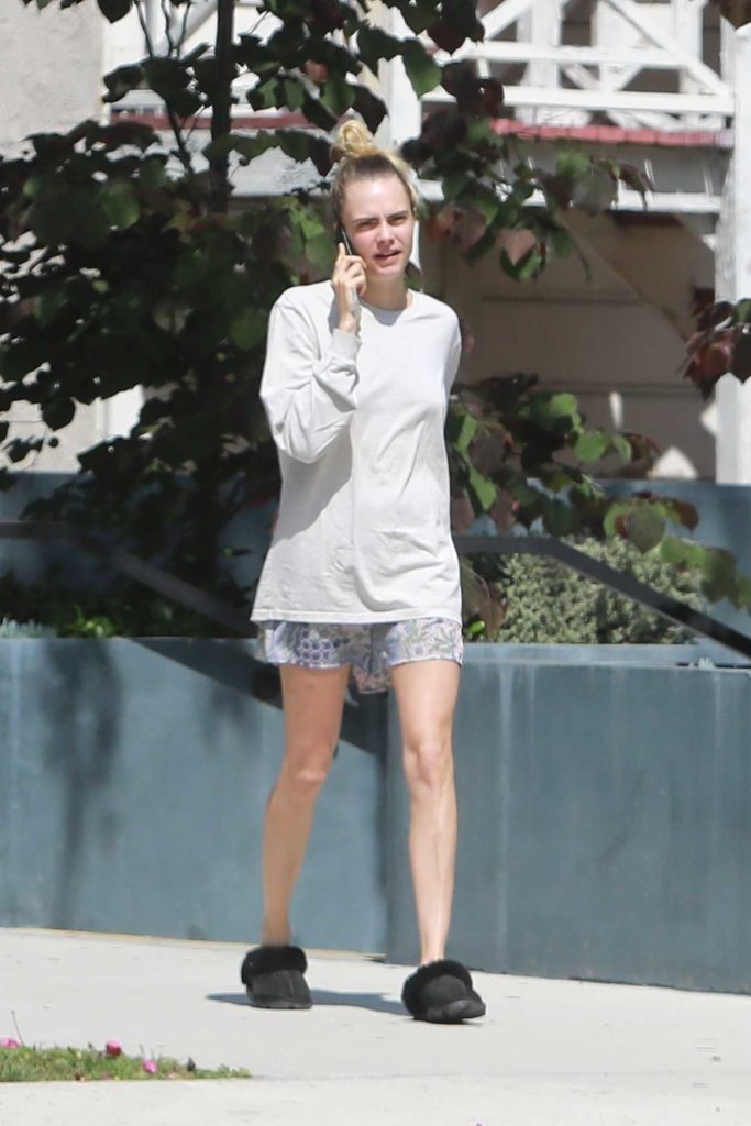 Cara Delevingne in a White Long Sleeves T-Shirt