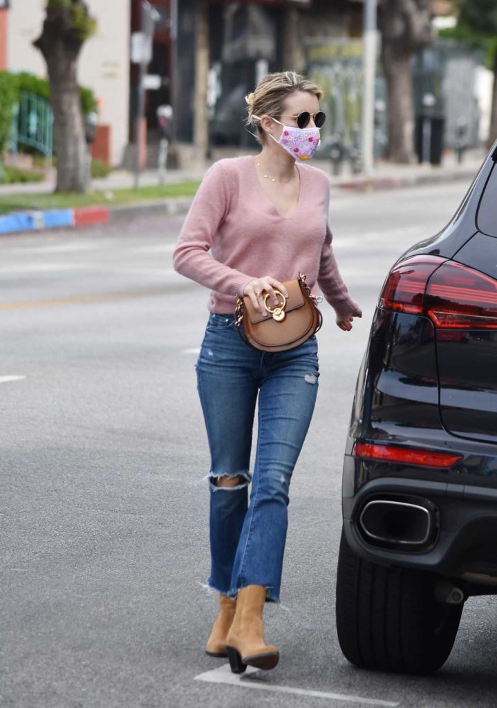 Emma Roberts in a Blue Ripped Jeans