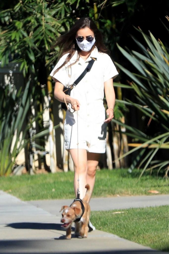Lily Collins in a Protective Mask