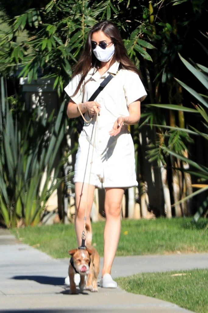 Lily Collins in a Protective Mask