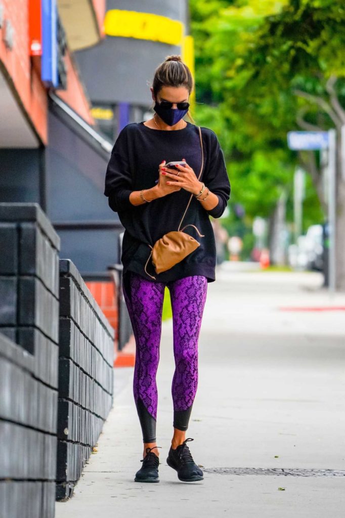 Alessandra Ambrosio in a Purple Leggings