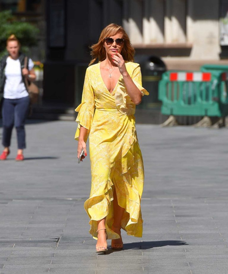 Amanda Holden in a Yellow Dress Exits the Heart Radio in London 06/22