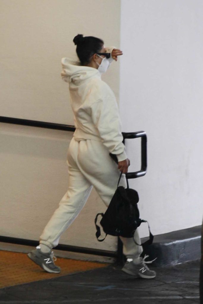 Kourtney Kardashian in a Protective Mask