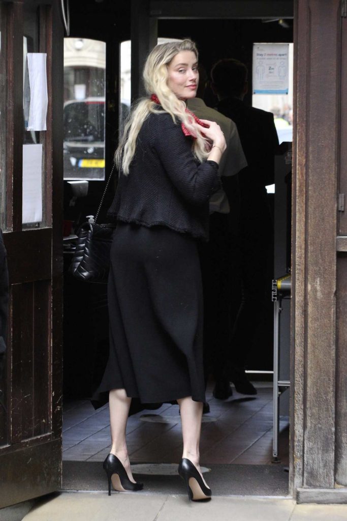 Amber Heard in a Black Skirt