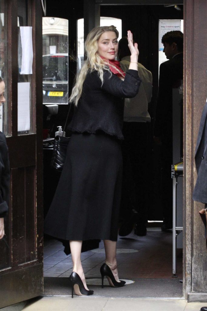 Amber Heard in a Black Skirt