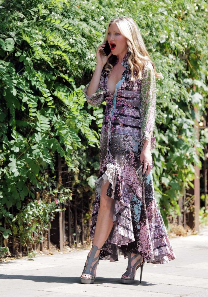 Caprice Bourret in a Floral Dress