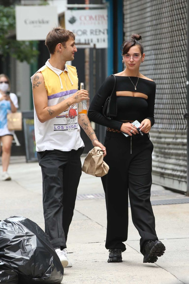 Dua Lipa in a Black Pants Holds Hands with Boyfriend Anwar Hadid After ...