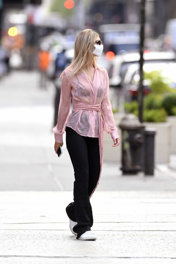 Emily Ratajkowski in a Pink Blouse